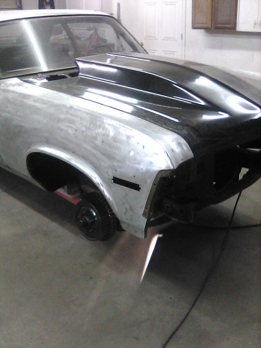 1971 chevrolet nova sedan orange rwd manual restomod