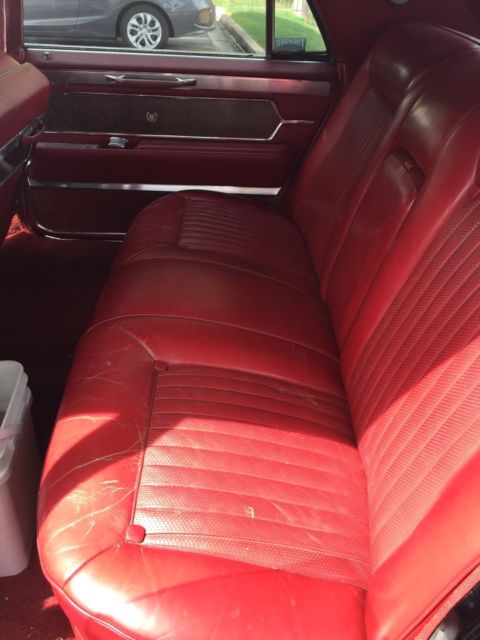 classic 1965 black cadillac fleetwood