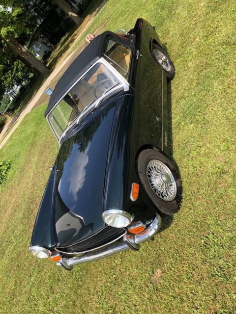 1970 mg midget with wire wheels, very clean, runs good, new tires, top, paint