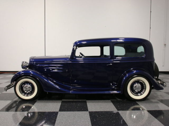 elegantly built '35 sedan, 350 v8, 4 bbl, 700r4, duals, r134a a/c, front discs!!