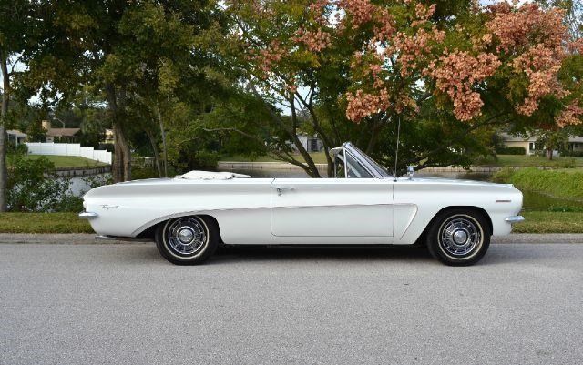 must sell... 1962 pontiac tempest lemans convertible, power top, cameo ivory