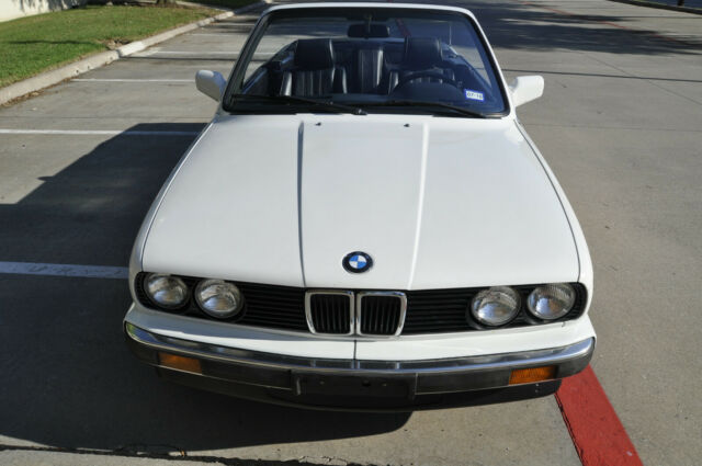 1987 bmw 325i convertible, 5 speed manual. well maintaioned. white/black 325ic