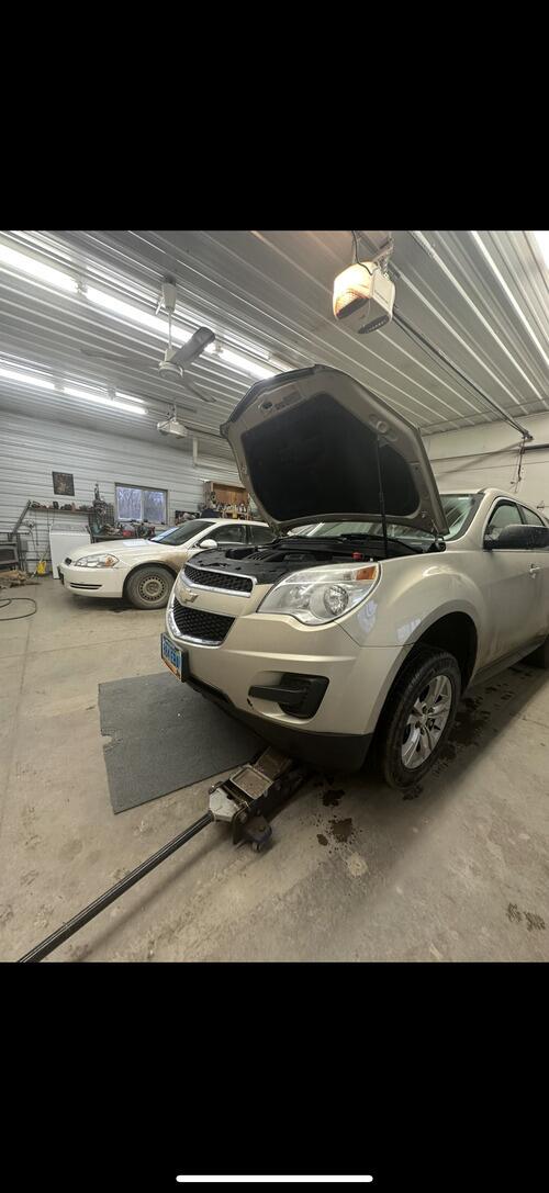 2012 chevy equinox. runs great front right tire squeaks a little. all new tires ne