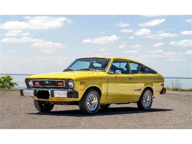 1977 datsun 210 in cadillac, michigan