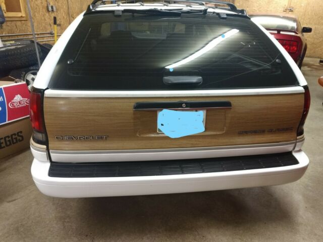 1994 chevrolet caprice station wagon white with wood grain panel 4 door