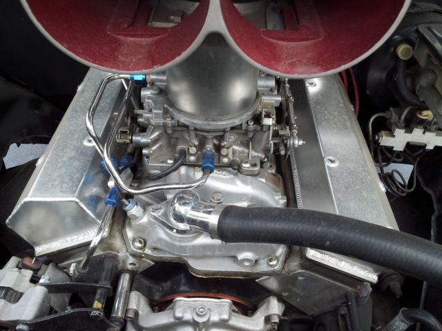 350 chevy engine, mother thumper cam kit,2-600 cfm carbs, 4.11 rearend