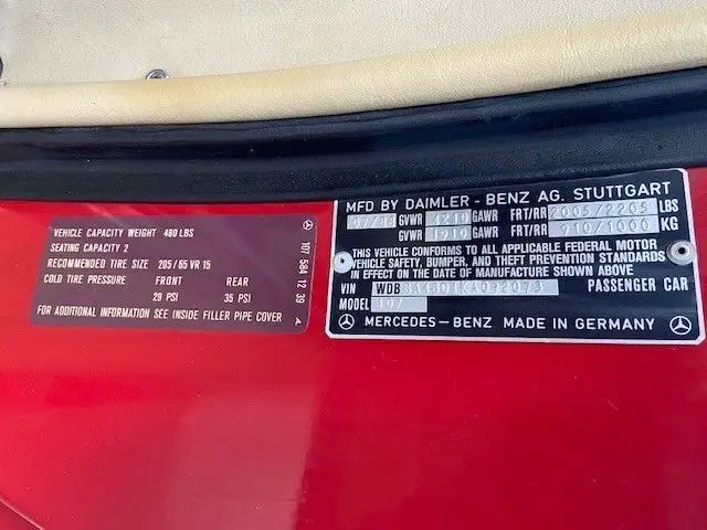 signal red exterior with palomino leather interior