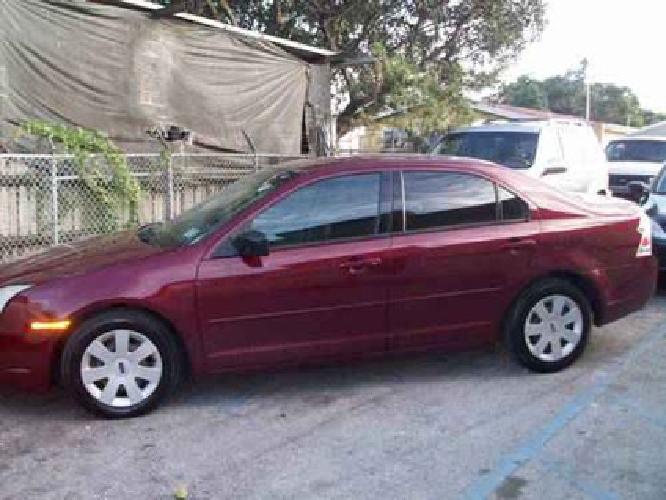 2006 ford fusion red ..........cash in miami, fl