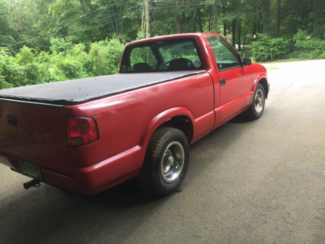 1994 chevy s10 pickup truck, red, 6 ft bed, 4 cyl