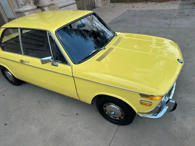 1969 bmw 02 (e10) coupe yellow rwd manual