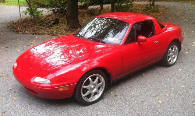 1991 red mazda miata in excellent condition! only 31,000 miles (none in winter)