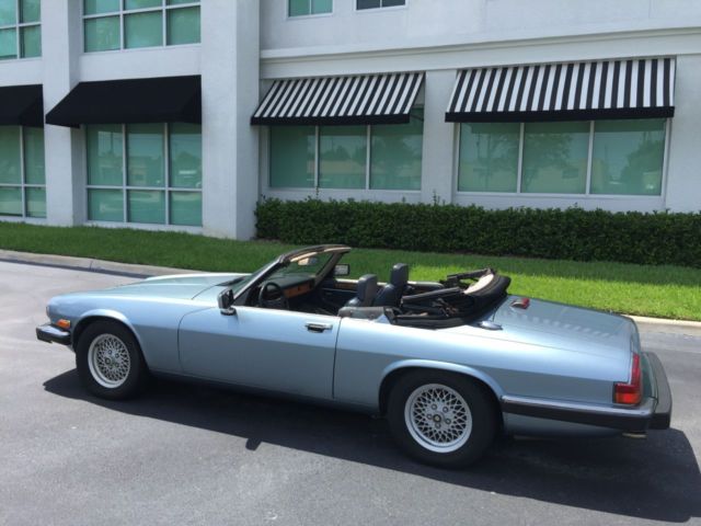 v12 convertible low miles garage kept books/records collector's item immaculate!