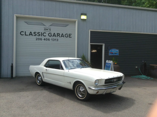 1964 1/2 white ford mustang coupe