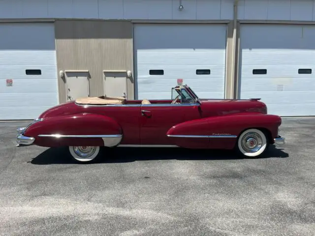 new convertible top, new leather interior and rebuilt engine