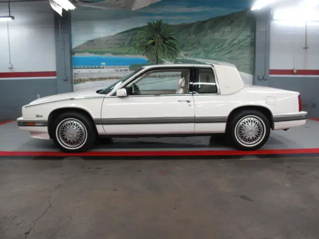 1990 eldorado biaritz..64k actual-no reserve-triple white-100% carfax certified