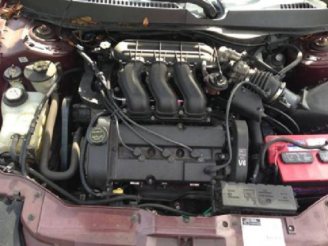 obo 2001 ford taurus - clean title - 130k miles - drives perfect in orlando, fl