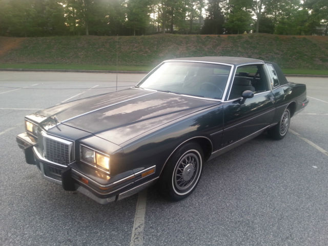 all original 2-owner car with low miles and loaded with options