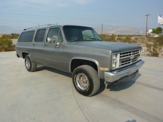 1987 chevrolet suburban 4x4 one owner 94000 miles xint rear air 3 rows of seats
