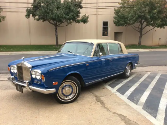 gorgeous blue rolls royce with leather interior