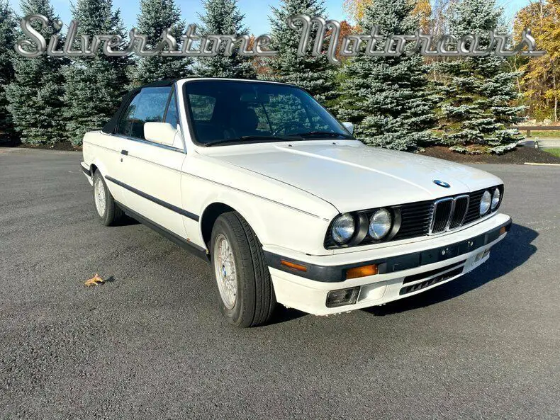 1992 white convertible 5 speed e30 recovered seats and panels