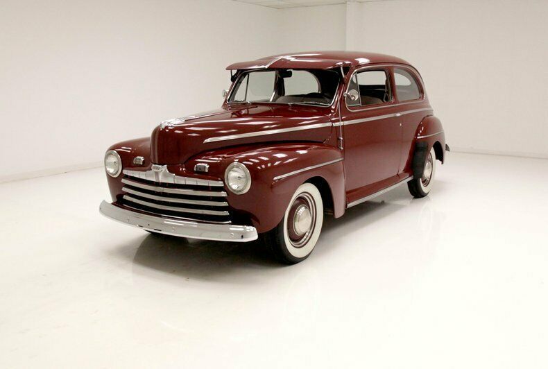 beautiful broadcloth seats/239ci v8 3-speed manual/wide whites & moon caps