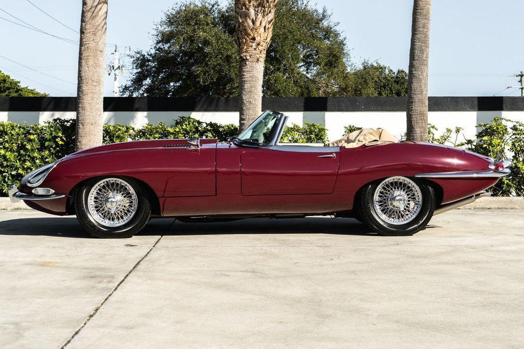 1964 jaguar e type series i roadster opalescent maroon beige interior