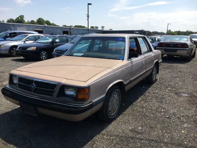 a kcar aries america sedan with 118k miles ! runs well