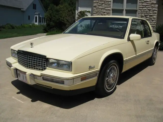 15,400 original miles, desirable rare cameo ivory & yellow leather, ice cold a/c