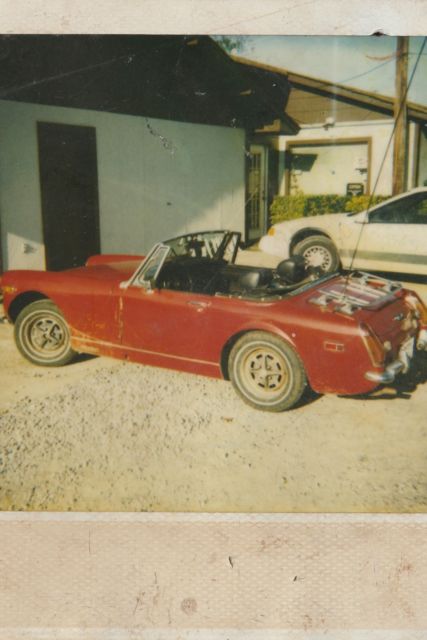 automobile 1973 mg midget cv. mileage 89,854 miles