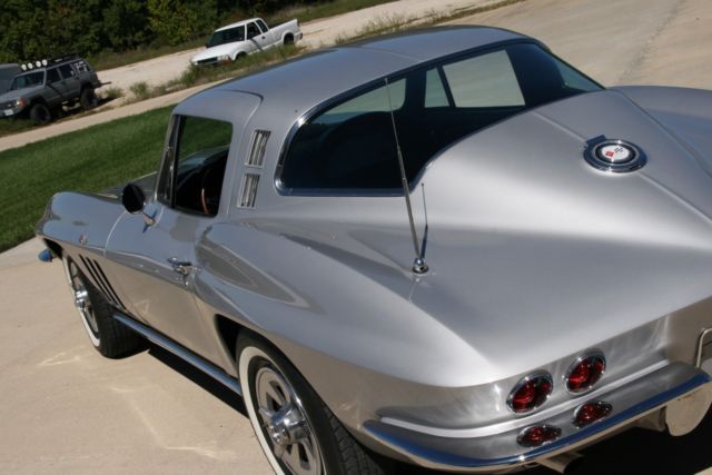 1965 corvette coupe silver pearl with black telescopic power brakes and windows