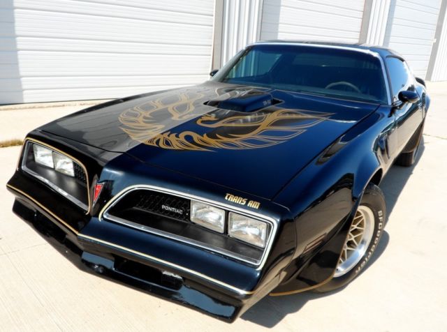 black 1978 trans am with a 400 engine and show like quality paint