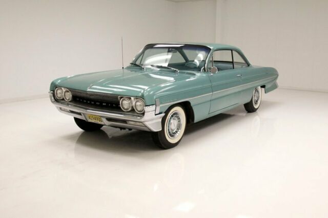 40,443 original miles/tropical mist paint/394ci rocket v8/3 owner car