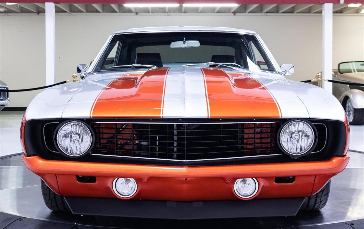 1969 chevrolet camaro restomod in custom matrix tangerine/andromeda silver