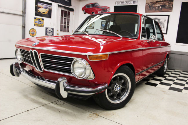 red roundie, coilovers, 5 speed, e12 tii head