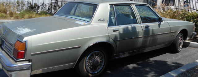 1985 oldsmobile delta 88 royale brougham sedan 4-door 5.7l