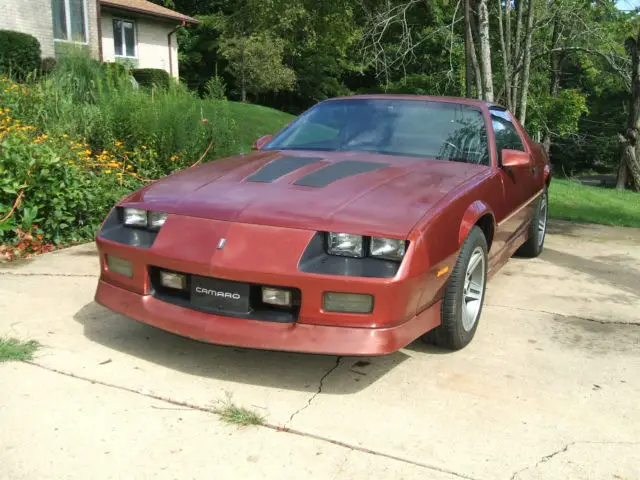 1986 chevrolet camaro z 28 iroc z 5.0 305 tpi 4 spd automatic dark red metallic