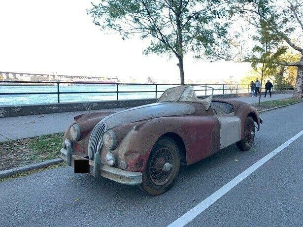 1955 jaguar xk xk140 highly original red with black interior awaiting restoration