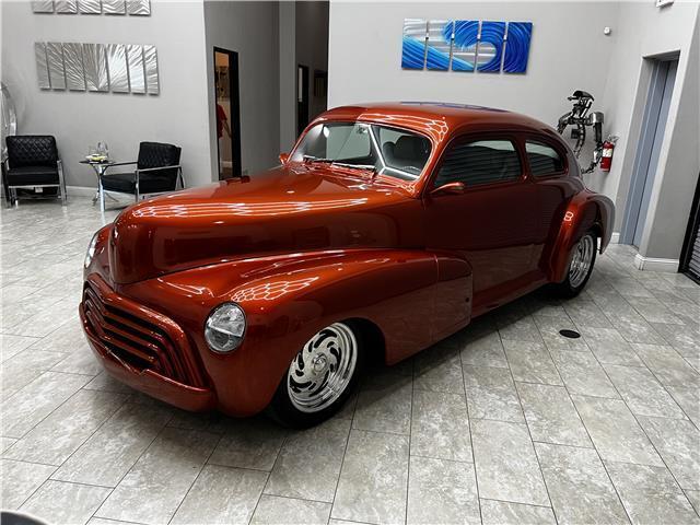 1948 chevy fleetline orange with 12384 miles
